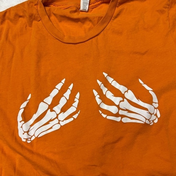 Orange Halloween spooky skeleton hands holding top no flaws. - Picture 2 of 3